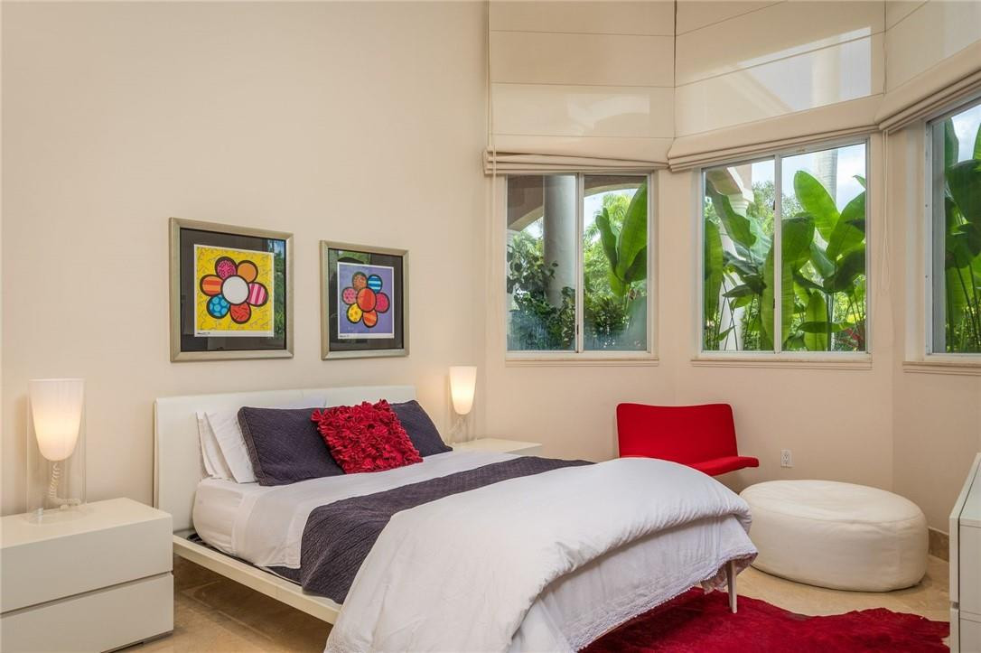 3620 Paddock Road Weston, FL 33331 - Photo 26 of 51 a bedroom with a bed and a large window with outer view
