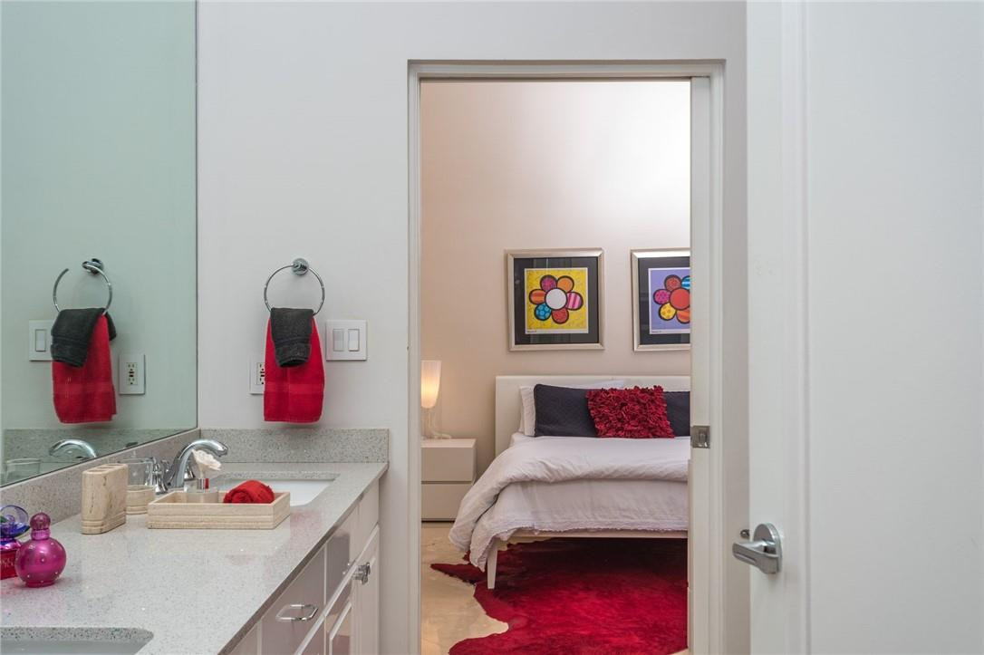 3620 Paddock Road Weston, FL 33331 - Photo 27 of 51 a en suite bathroom with a sink and a mirror