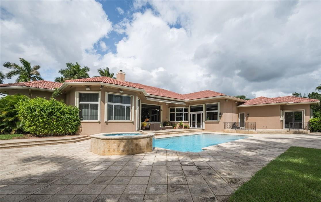 3620 Paddock Road Weston, FL 33331 - Photo 34 of 51 front view of a house with a yard