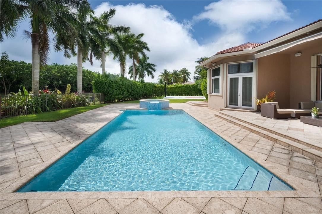 3620 Paddock Road Weston, FL 33331 - Photo 36 of 51 front view of a house with a patio