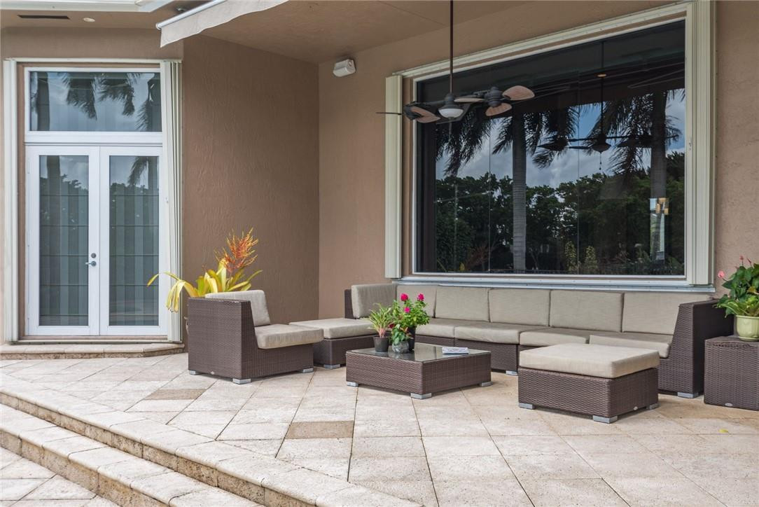 3620 Paddock Road Weston, FL 33331 - Photo 38 of 51 a living room with furniture and a potted plant