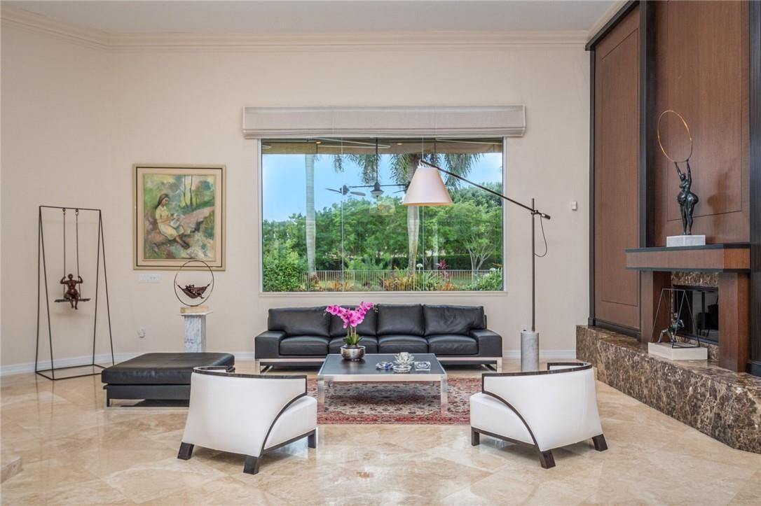 3620 Paddock Road Weston, FL 33331 - Photo 4 of 51 a living room with furniture and a large window