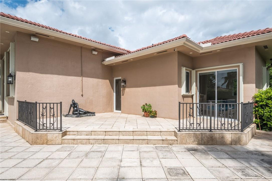3620 Paddock Road Weston, FL 33331 - Photo 43 of 51 a view of a balcony with a white door and wooden floor