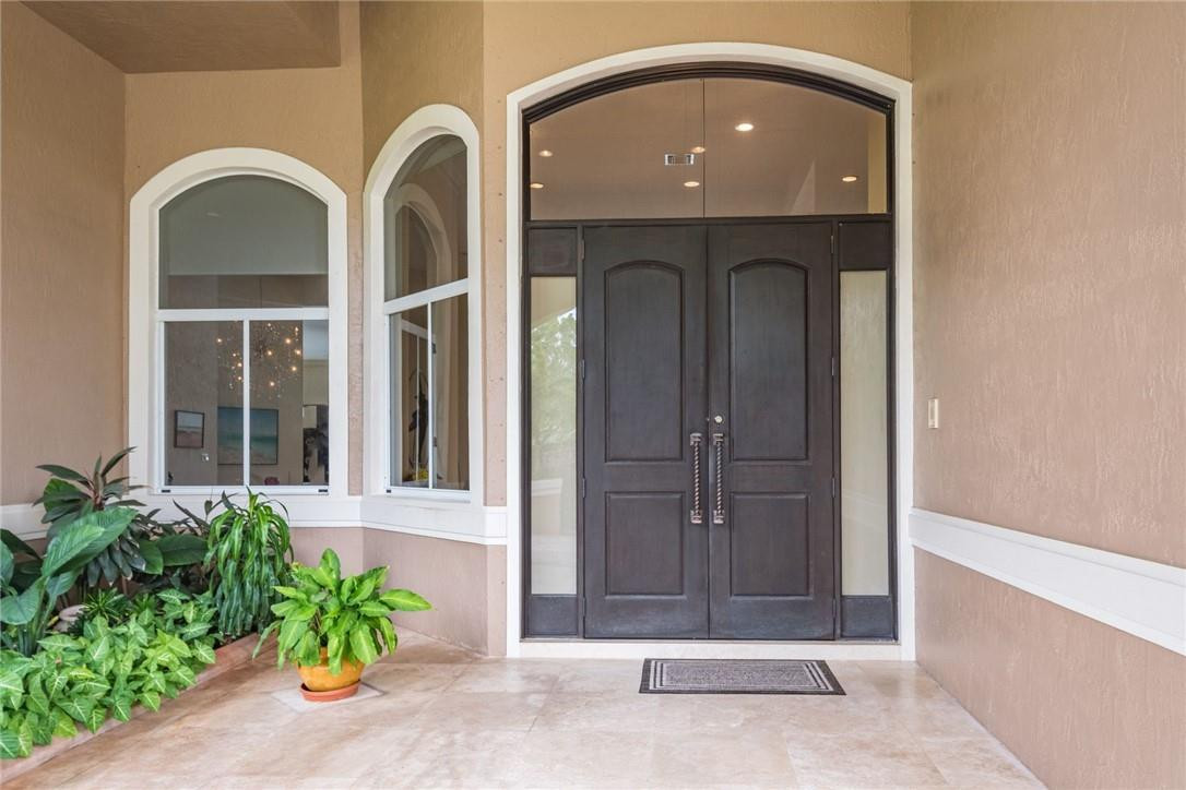 3620 Paddock Road Weston, FL 33331 - Photo 45 of 51 a front view of a house with a garden