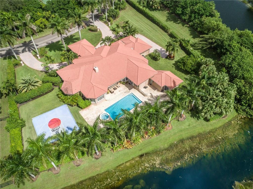 3620 Paddock Road Weston, FL 33331 - Photo 50 of 51 an aerial view of a house with yard