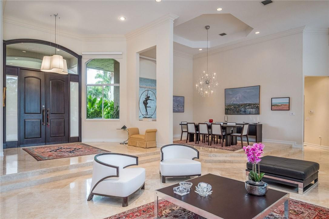 3620 Paddock Road Weston, FL 33331 - Photo 10 of 51 a living room with furniture and a large window