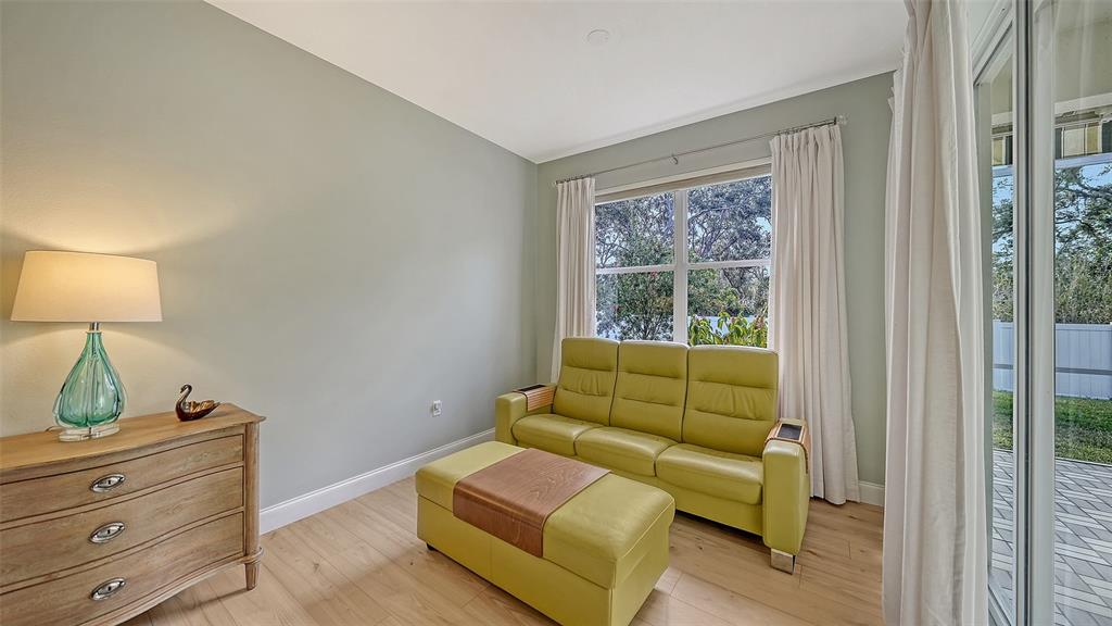 4855 Carrington Circle Sarasota, FL 34243 - Photo 24 of 58 a living room with furniture and a window