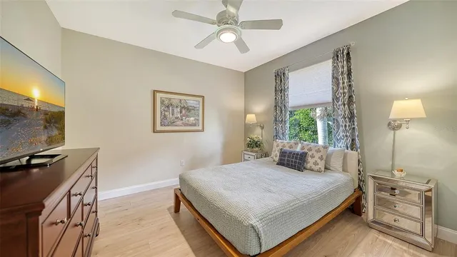 a bathroom with a toilet sink and shower