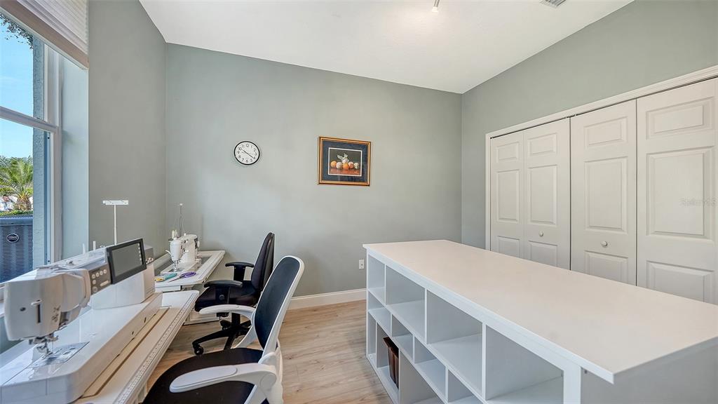 4855 Carrington Circle Sarasota, FL 34243 - Photo 36 of 58 a view of a dining room with furniture