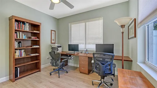 a view of a patio with a dining table and chairs