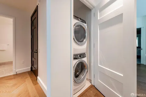 a view of a dining room with furniture and window