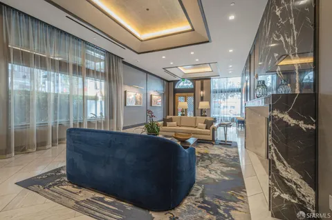 a living room with furniture and a couch