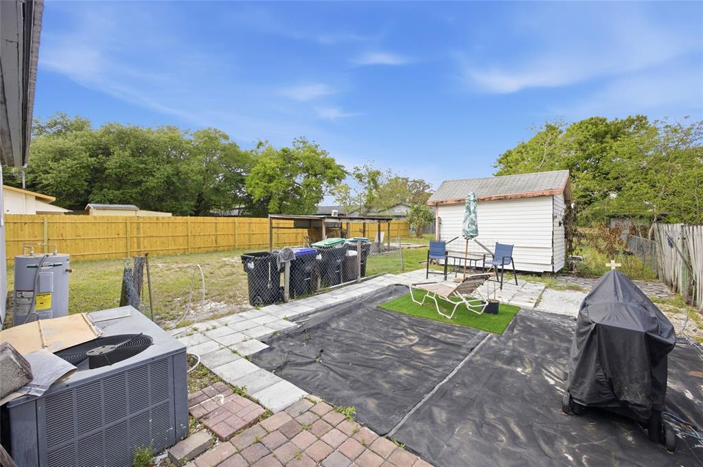 10535 3rd Avenue Ocoee, FL 34761 - Photo 13 of 22 a view of a backyard with sitting area