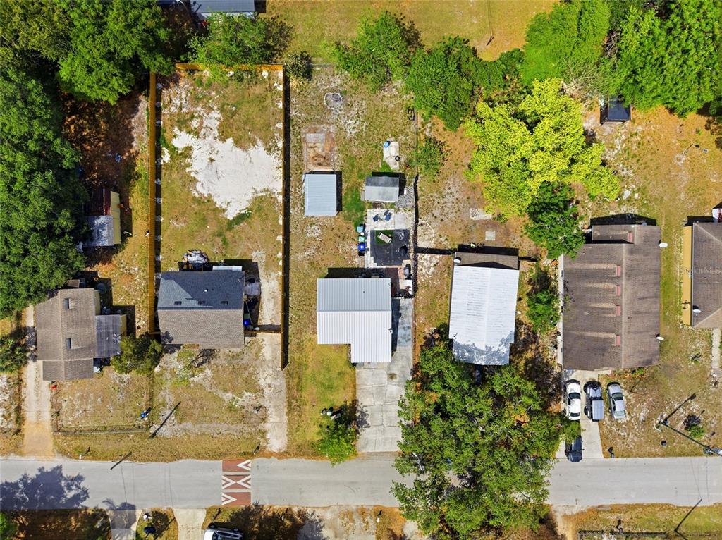 10535 3rd Avenue Ocoee, FL 34761 - Photo 18 of 22 an aerial view of multiple houses with yard