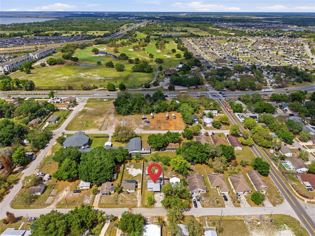 10535 3rd Avenue Ocoee, FL 34761 - Photo 19 of 22 an aerial view of residential houses with outdoor space