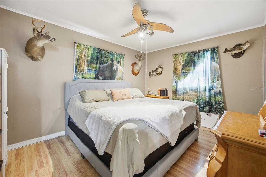 10535 3rd Avenue Ocoee, FL 34761 - Photo 9 of 22 a bedroom with a bed and window