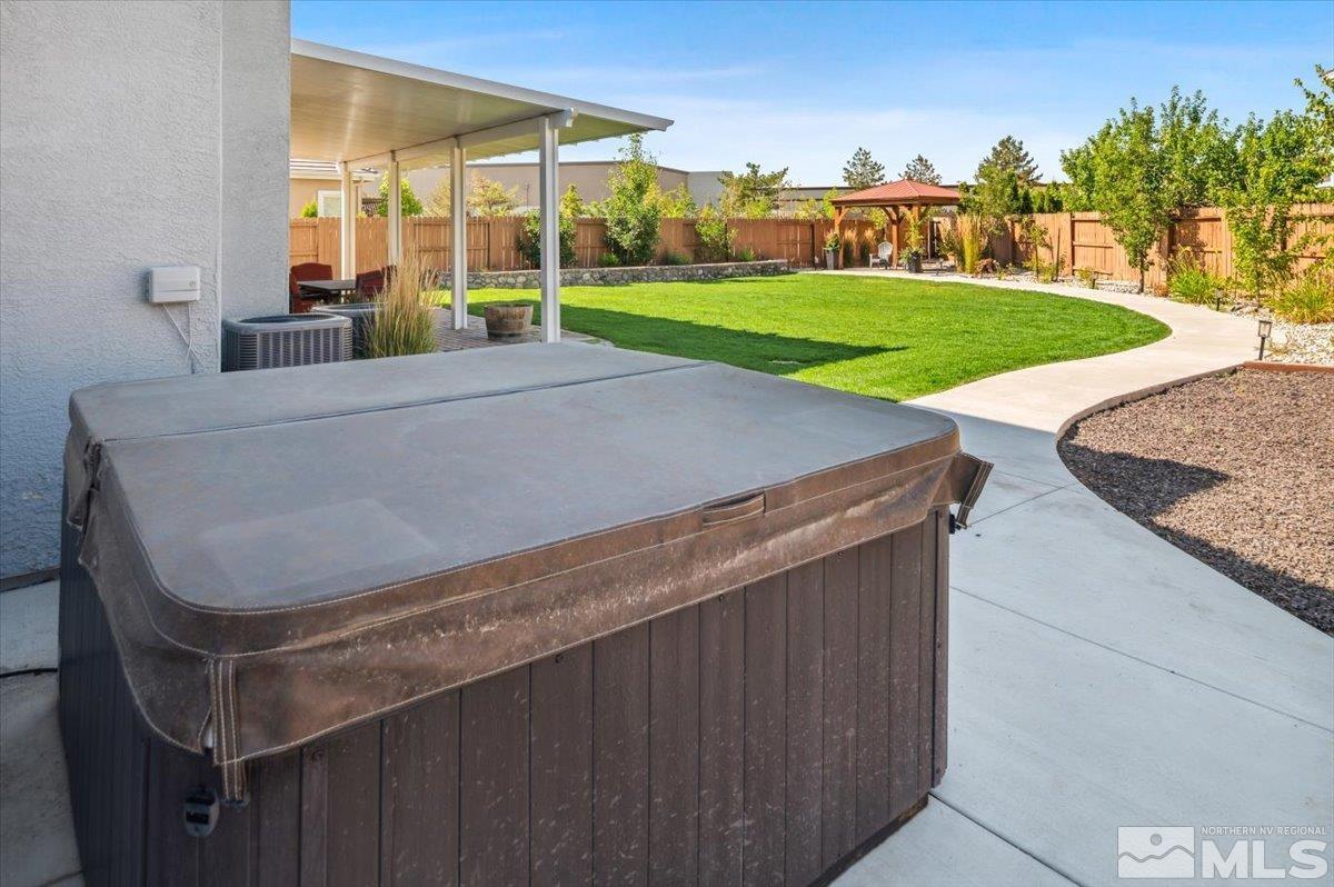 1602 Silver Thread Drive Reno, NV 89521 - Photo 38 of 39 a terrace with outdoor seating and trees