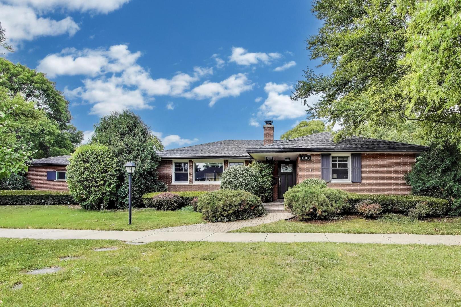 1000 East Lincoln Street Mount Prospect, IL 60056 - Photo 1 of 37 a front view of house with yard and green space