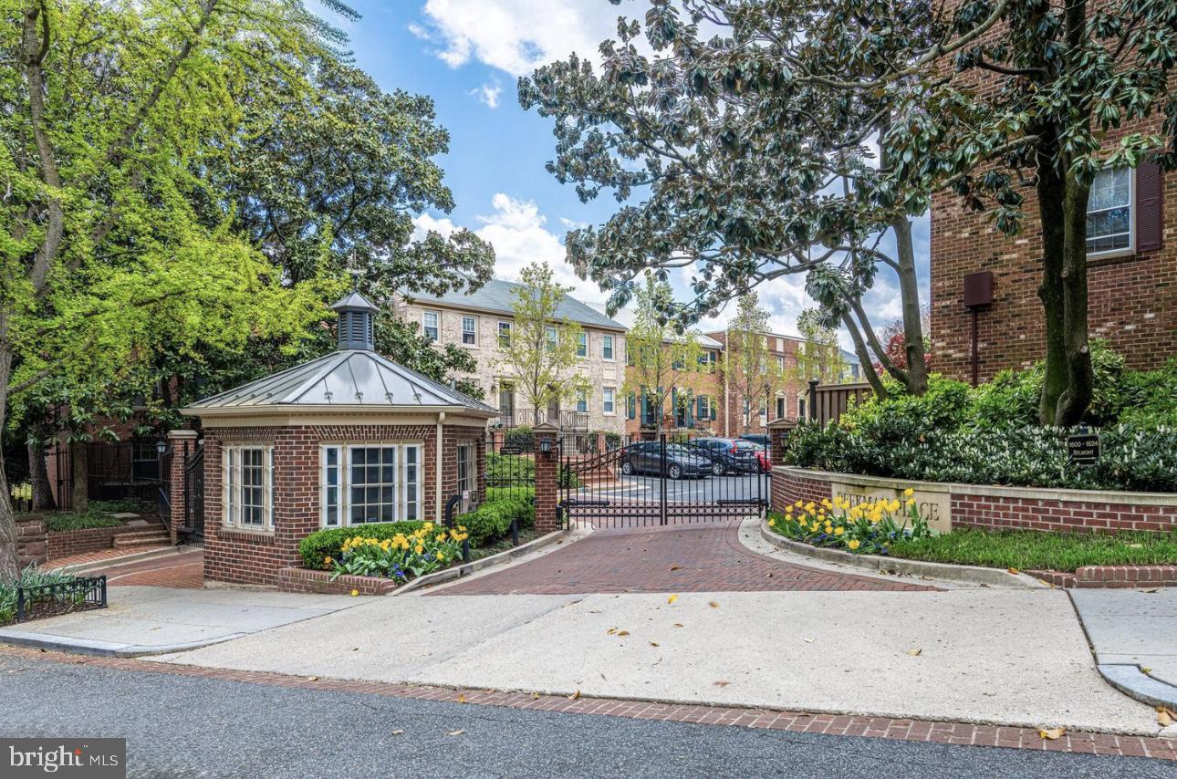 1660 Beekman Place Northwest, Unit A Washington, DC 20009 - Photo 1 of 24 Charming gated entrance with lush greenery.