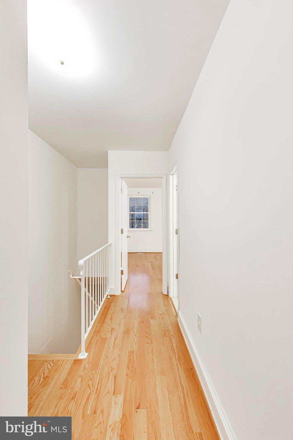 1660 Beekman Place Northwest, Unit A Washington, DC 20009 - Photo 13 of 24 Bright and airy hallway invites exploration.