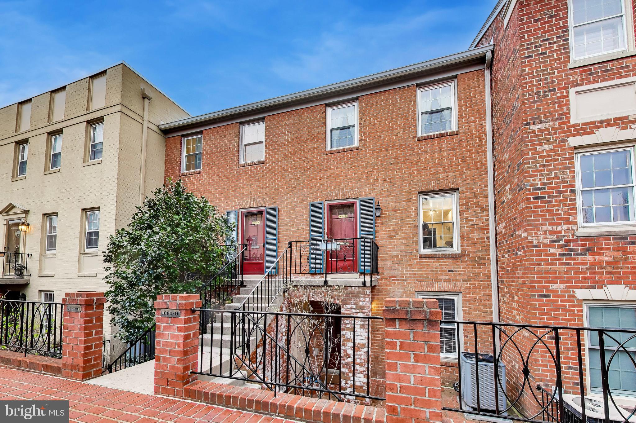 1660 Beekman Place Northwest, Unit A Washington, DC 20009 - Photo 2 of 24 Charming brick facade with inviting entry.