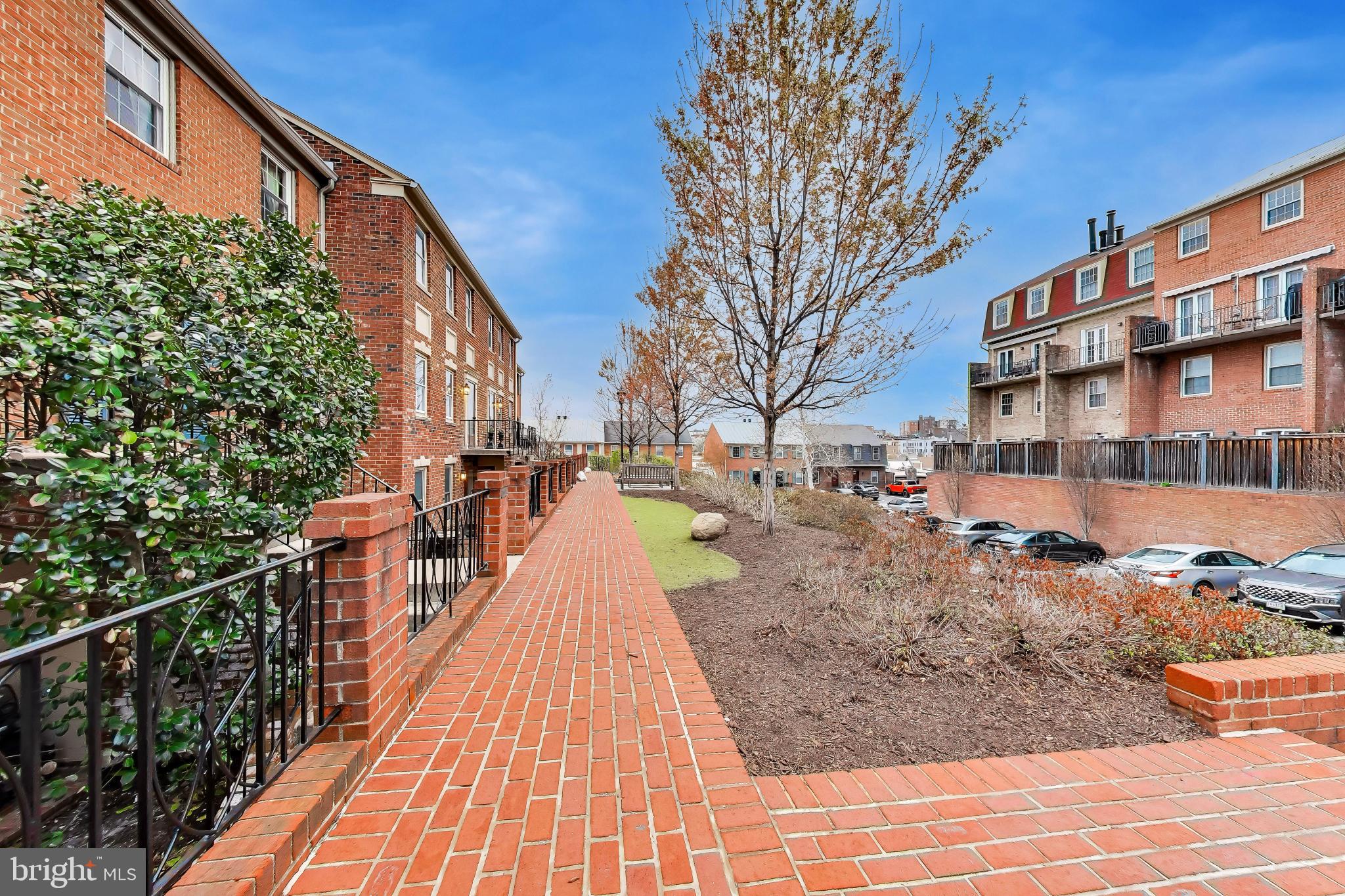 1660 Beekman Place Northwest, Unit A Washington, DC 20009 - Photo 3 of 24 Charming brick pathway in serene setting.
