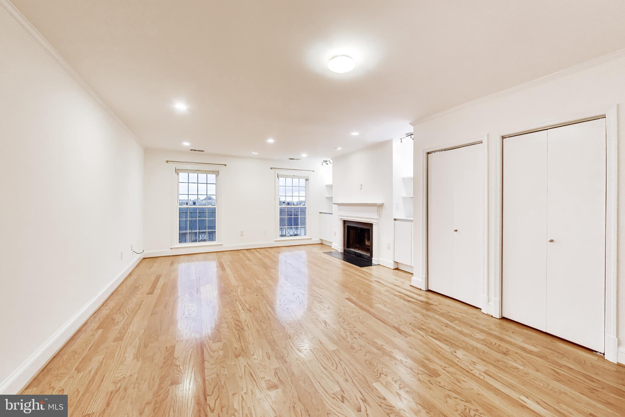 1660 Beekman Place Northwest, Unit A Washington, DC 20009 - Photo 5 of 24 Spacious, sunlit living area awaits you.