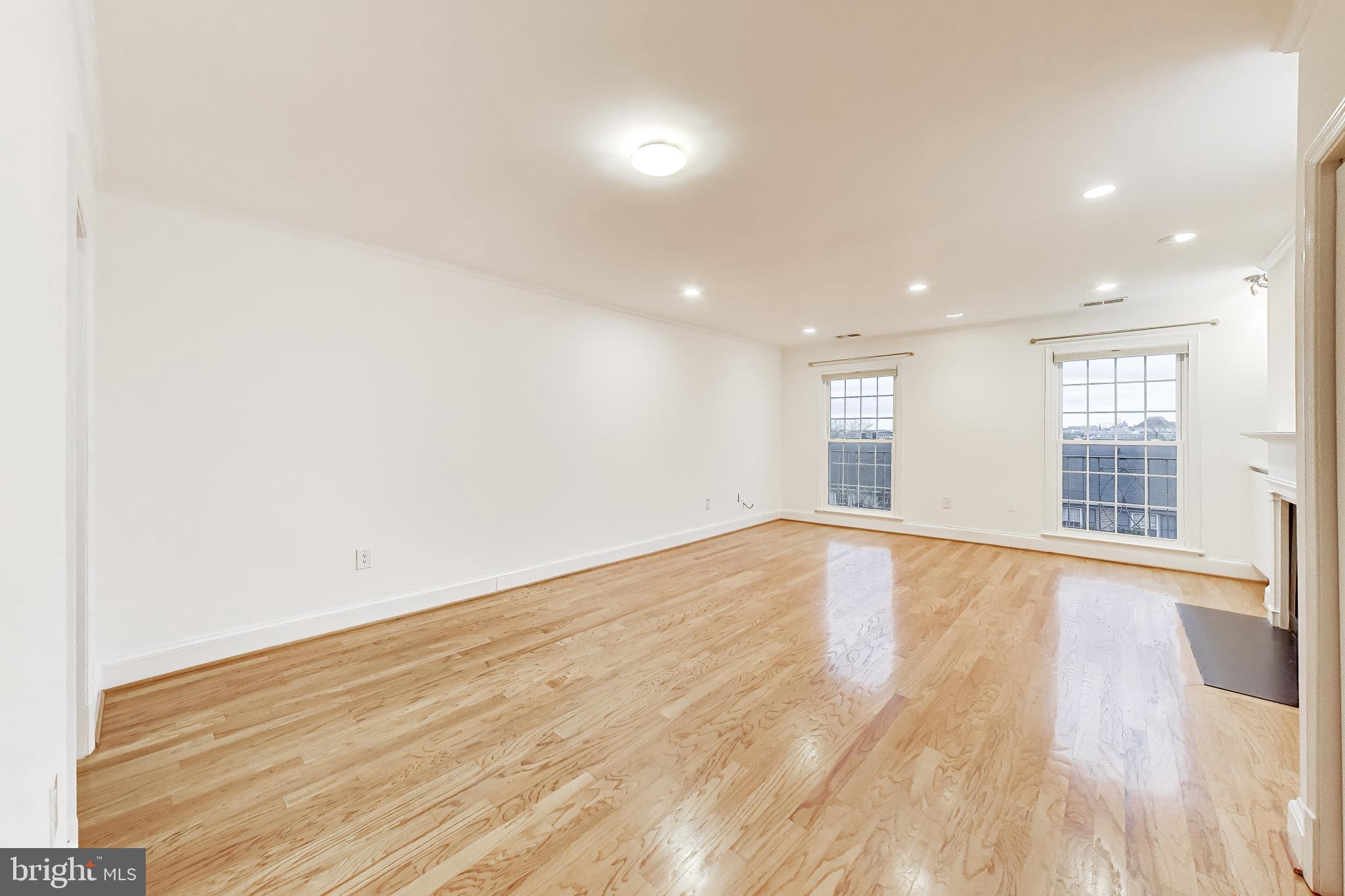 1660 Beekman Place Northwest, Unit A Washington, DC 20009 - Photo 6 of 24 Spacious, sunlit room with elegance.