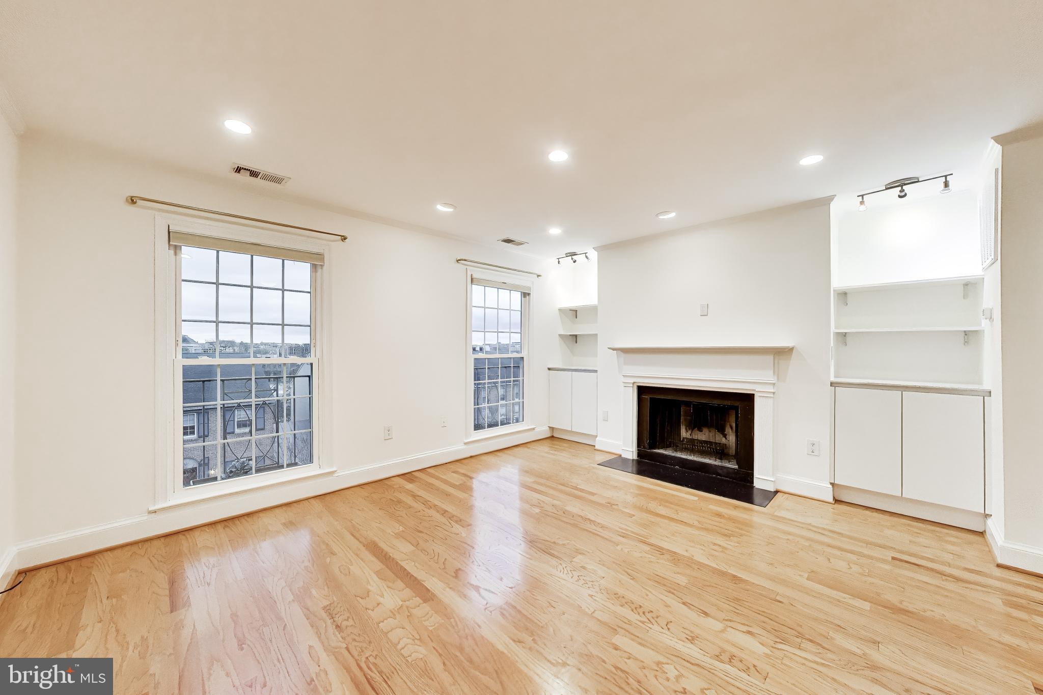 1660 Beekman Place Northwest, Unit A Washington, DC 20009 - Photo 7 of 24 Bright and airy living space awaits.