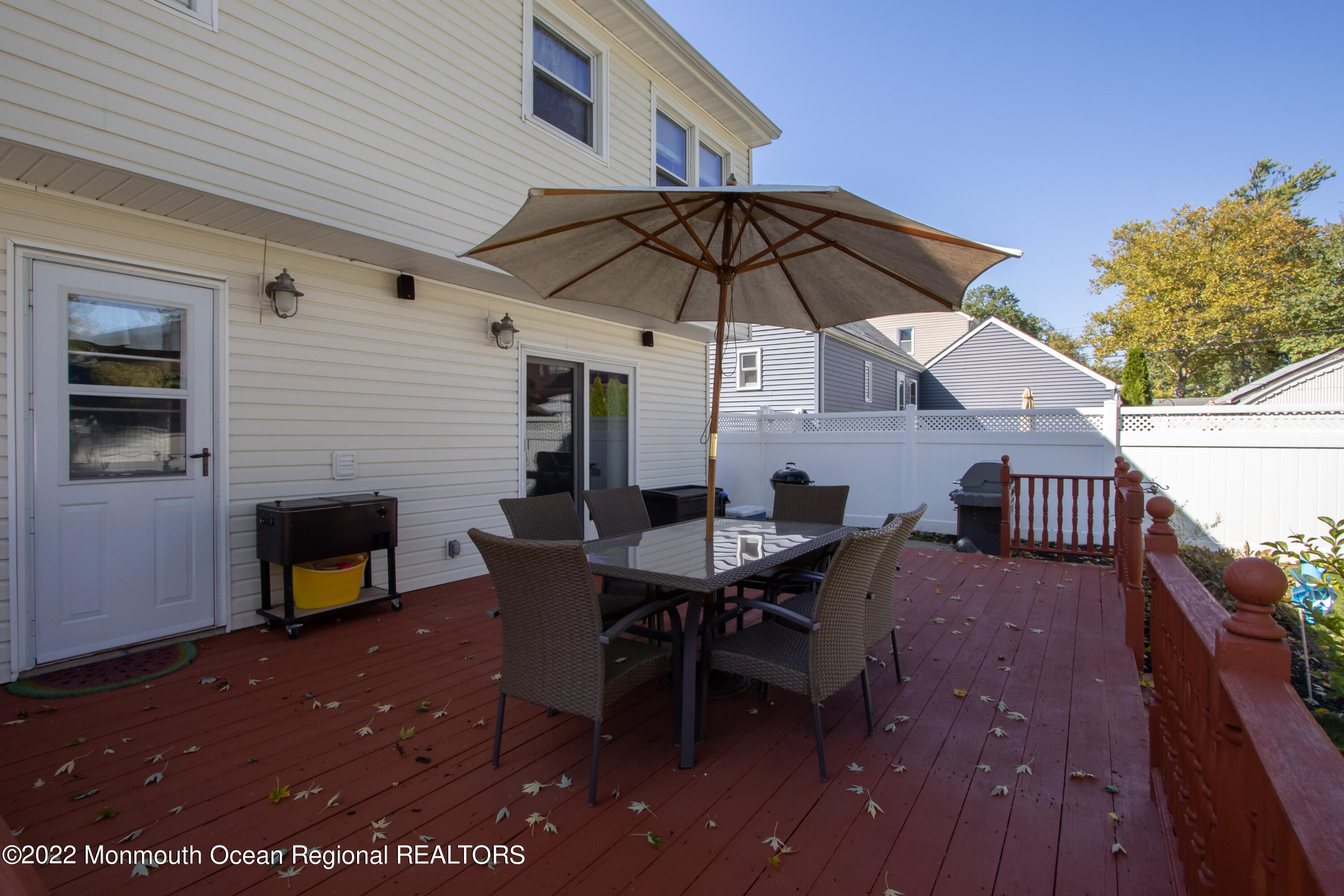 73 Ravine Drive Matawan, NJ 07747 - Photo 15 of 15 a view of a roof deck with furniture