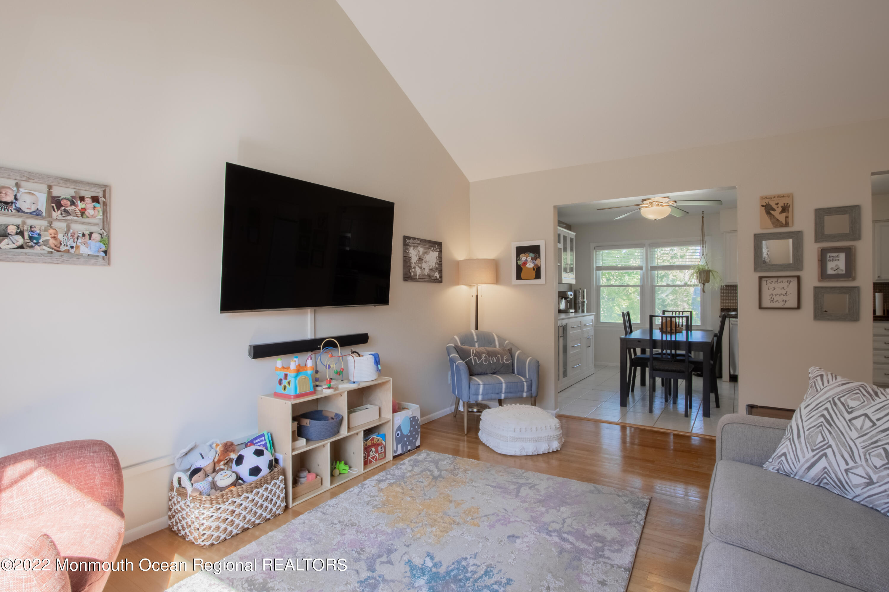 73 Ravine Drive Matawan, NJ 07747 - Photo 5 of 15 a living room with furniture and a flat screen tv