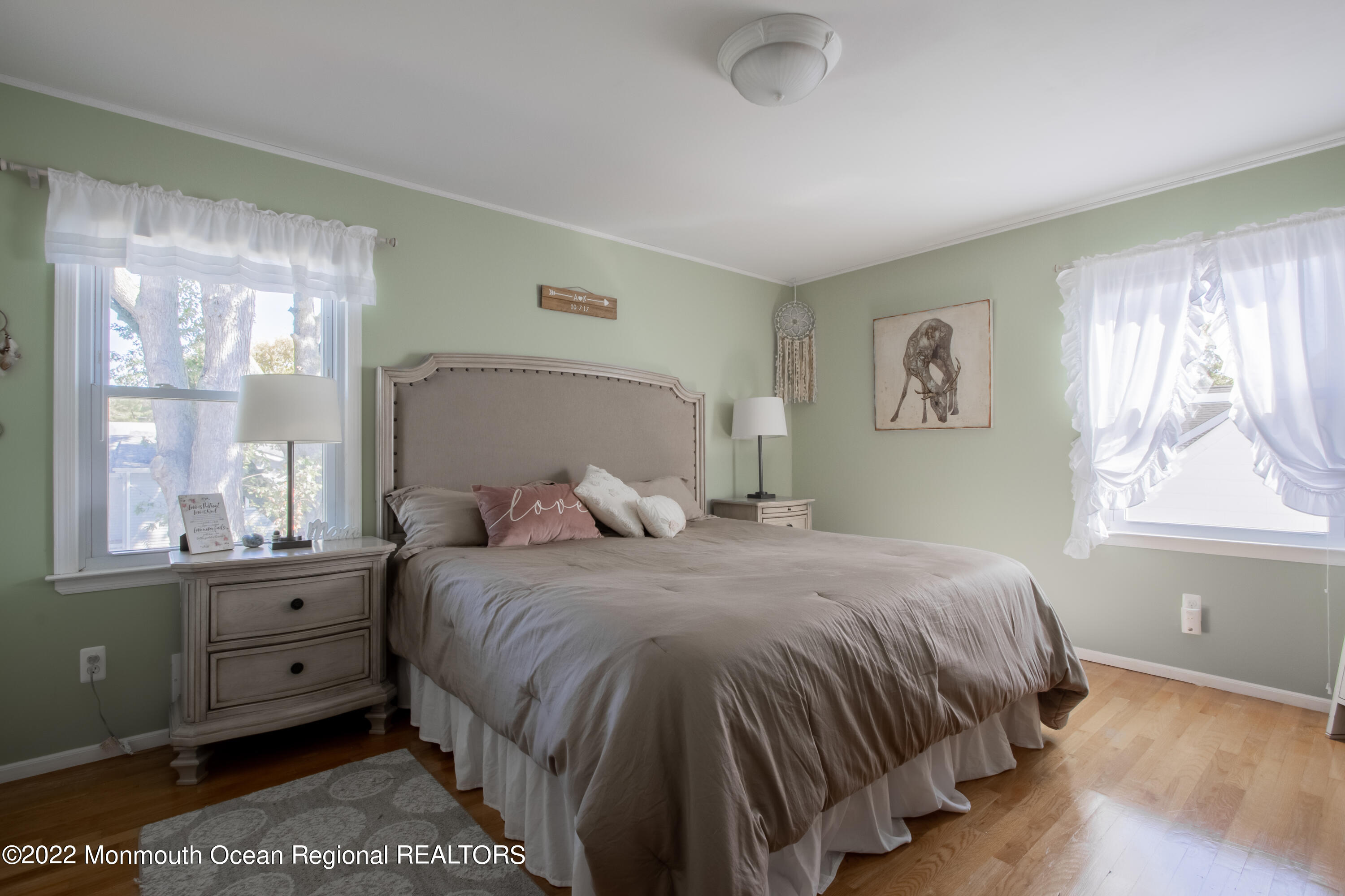 73 Ravine Drive Matawan, NJ 07747 - Photo 10 of 15 a bedroom with a bed and window