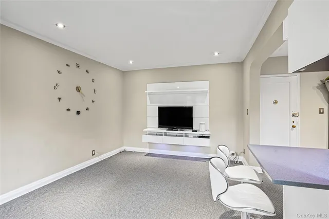 a room with furniture and wooden floor