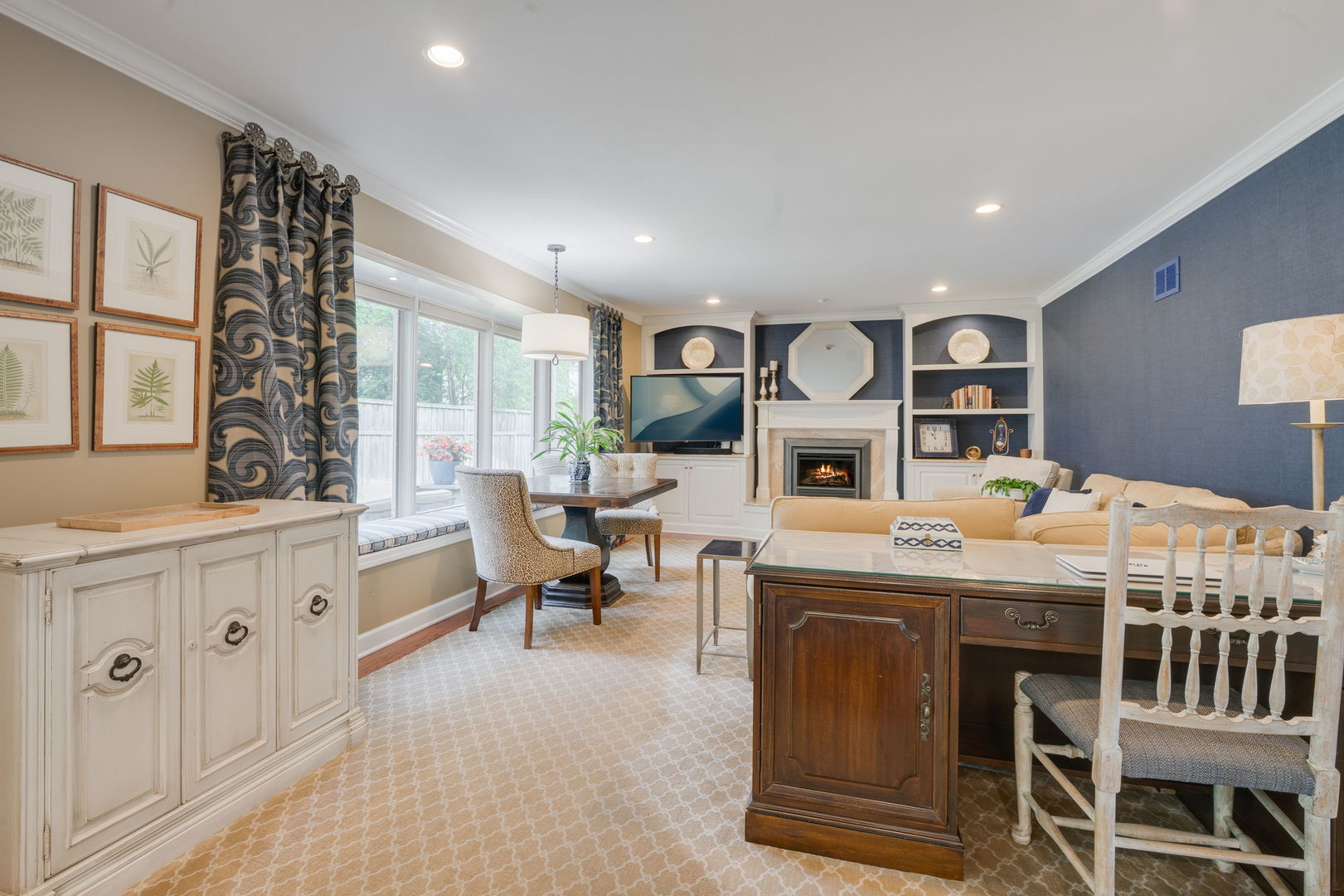 2022 Brandon Road Glenview, IL 60025 - Photo 16 of 35 a large kitchen with stainless steel appliances a stove a sink dishwasher and white cabinets with wooden floor