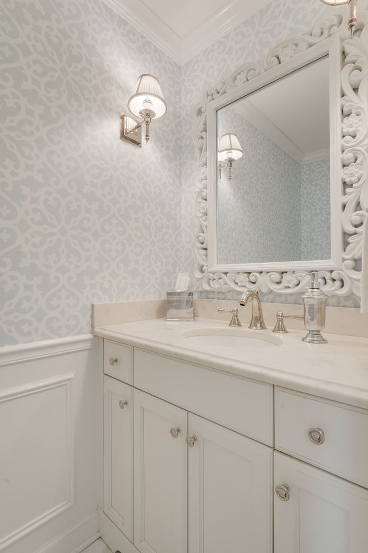 2022 Brandon Road Glenview, IL 60025 - Photo 17 of 35 a bathroom with a sink and a mirror