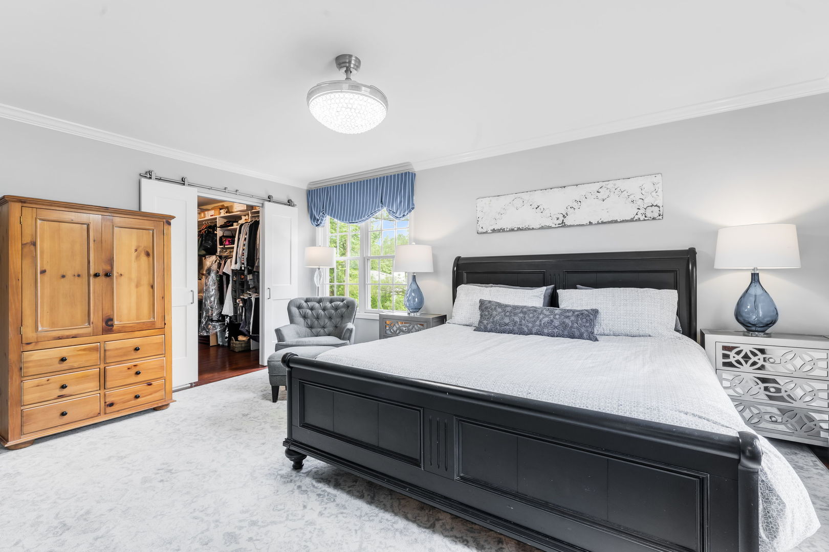 2022 Brandon Road Glenview, IL 60025 - Photo 19 of 35 a bedroom with a bed and a dresser