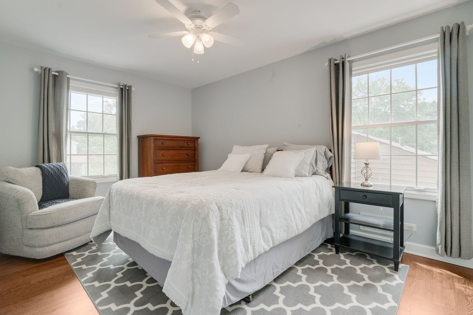 2022 Brandon Road Glenview, IL 60025 - Photo 27 of 35 a bedroom with a bed and a couch