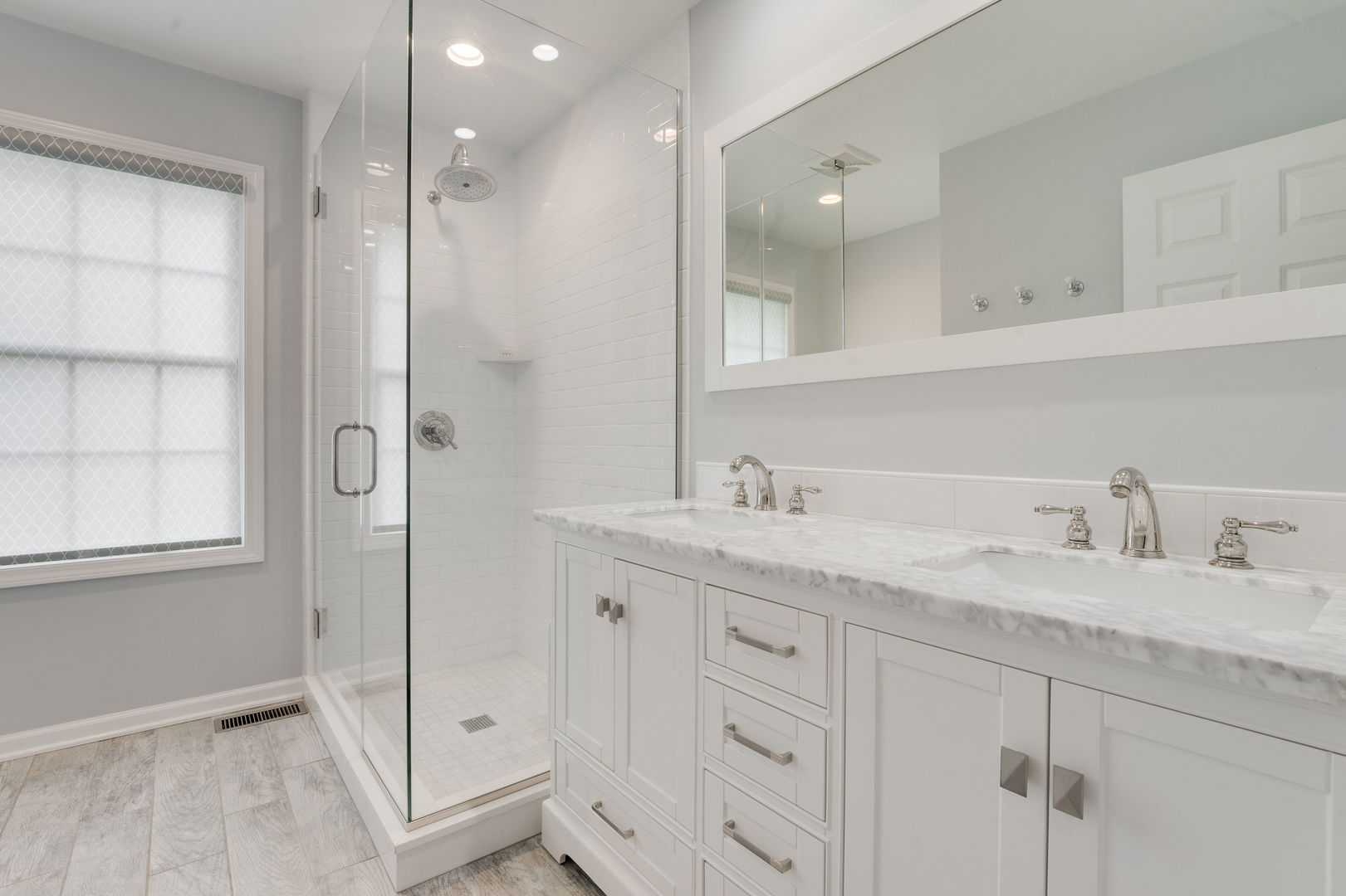 2022 Brandon Road Glenview, IL 60025 - Photo 28 of 35 a bathroom with a granite countertop sink mirror and double