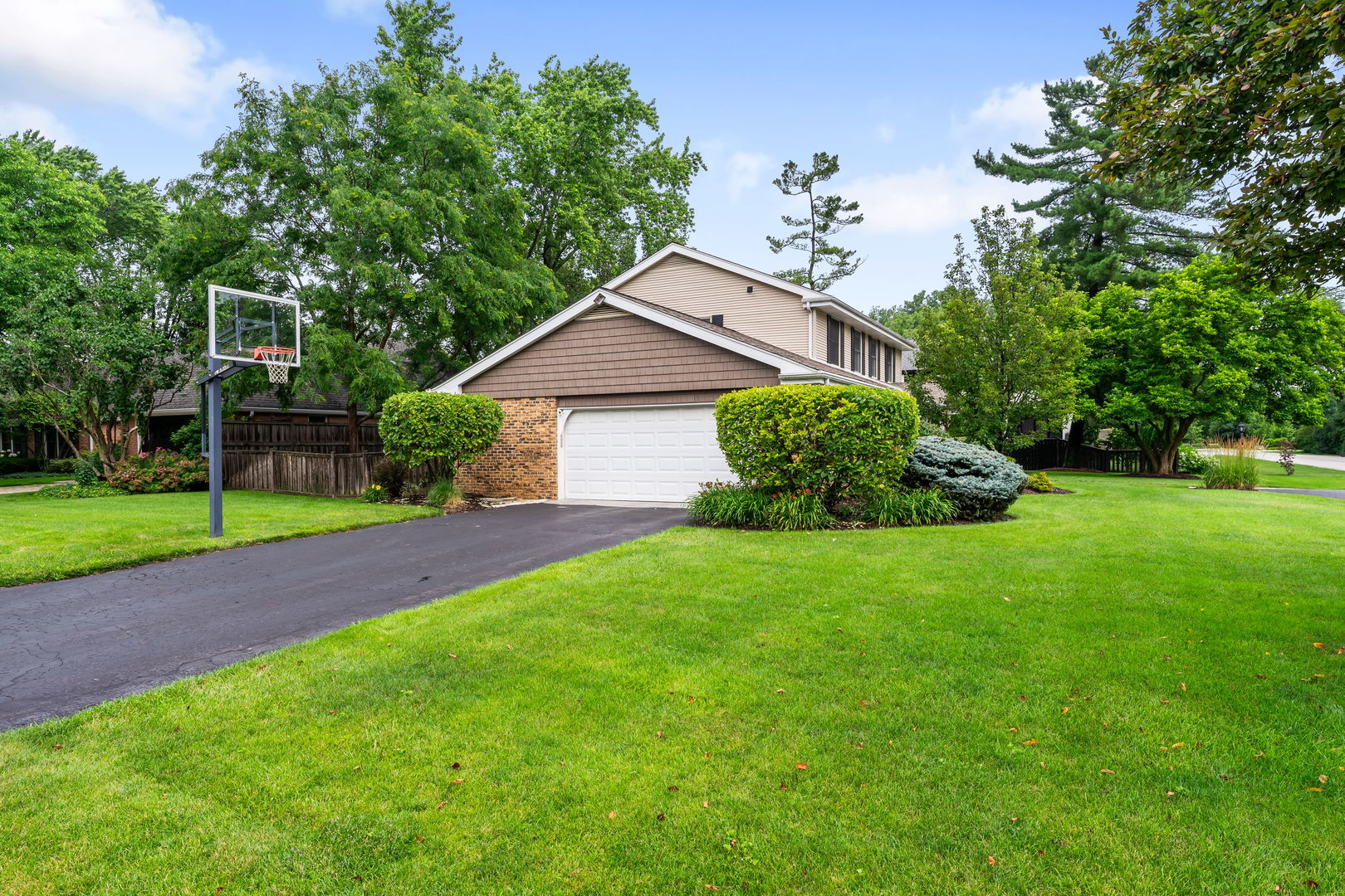 2022 Brandon Road Glenview, IL 60025 - Photo 3 of 35 a aerial view of a house with a yard and potted plants