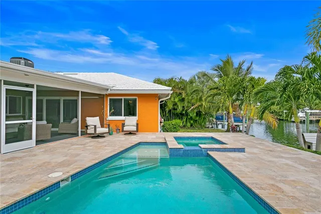 a bathroom with a toilet a sink and a mirror