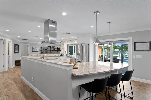 a bathroom with a sink vanity and a mirror