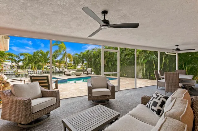 a kitchen with stainless steel appliances a refrigerator and cabinets