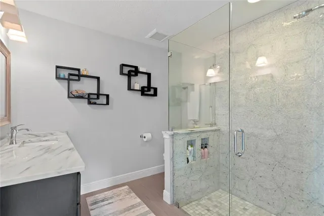 an aerial view of a house with a garden