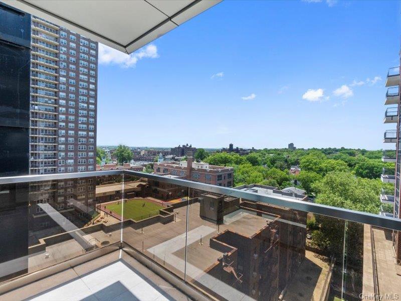 124-28 Queens Boulevard, Unit 12A Queens, NY 11415 - Photo 5 of 16 Balcony with a view of city