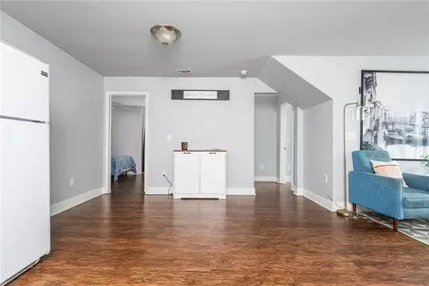 a view of a bathroom with tub