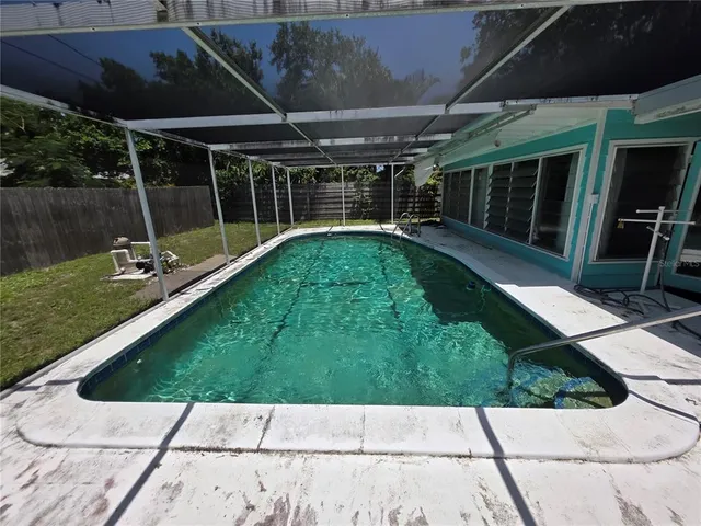 a view of backyard with seating space