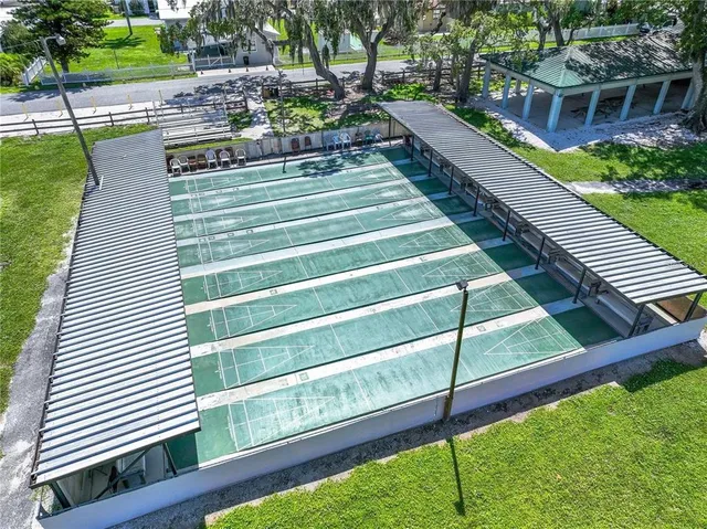 a view of a swimming pool with a patio