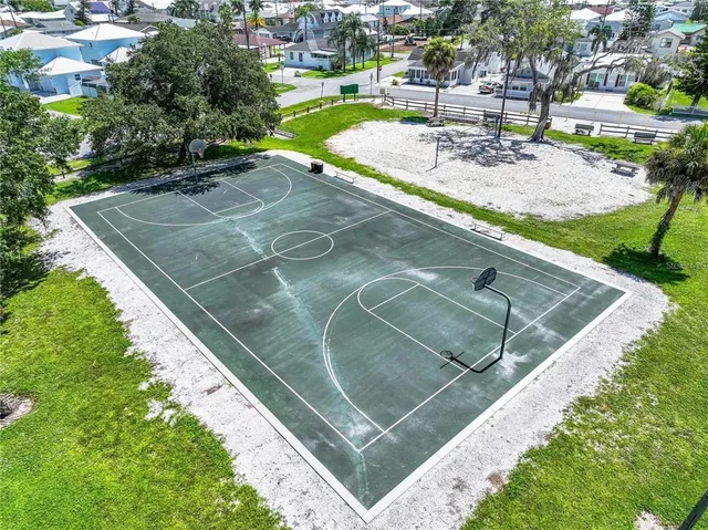 a view of a backyard with sitting area