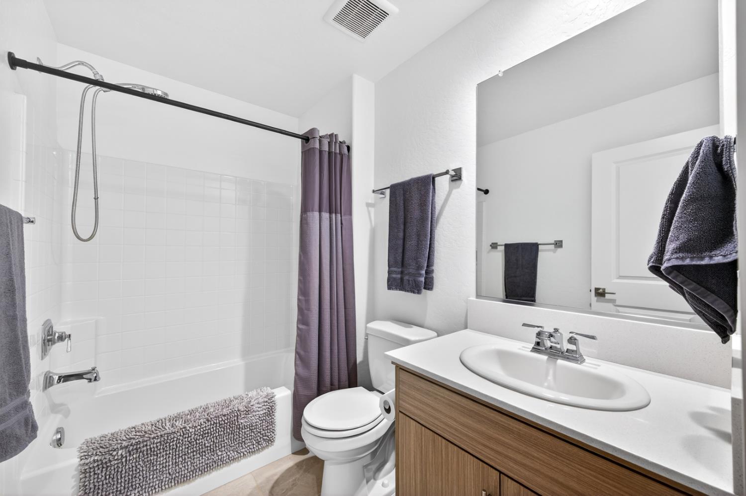 317 Talus Way South Madera, CA 93636 - Photo 38 of 61 a bathroom with a sink toilet and shower