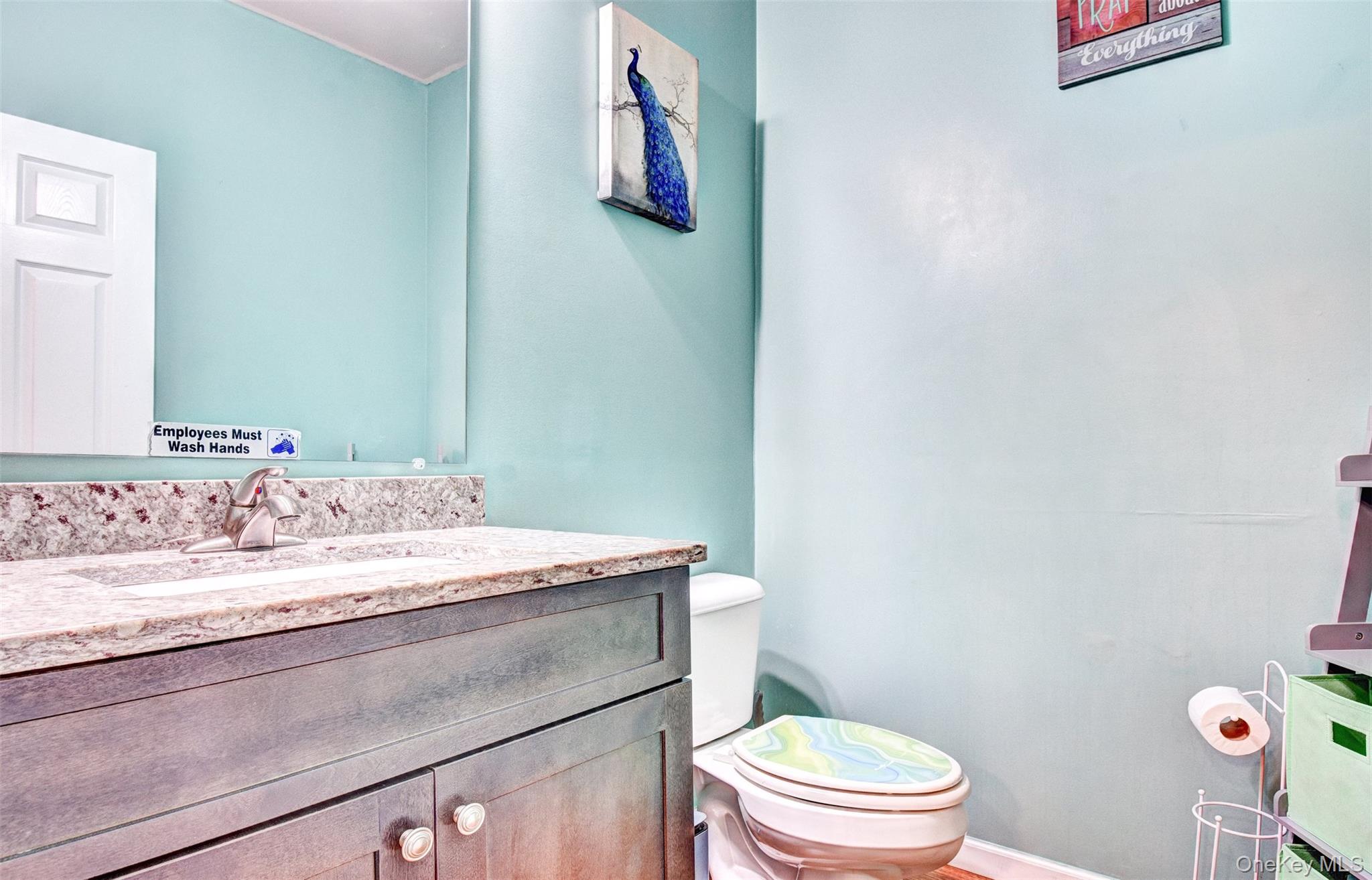 17 Magnolia Park Road Middletown, NY 10940 - Photo 14 of 35 a bathroom with a granite countertop sink and a toilet